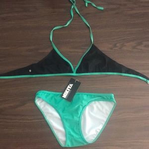 Brand new tags on Nikita swimsuit